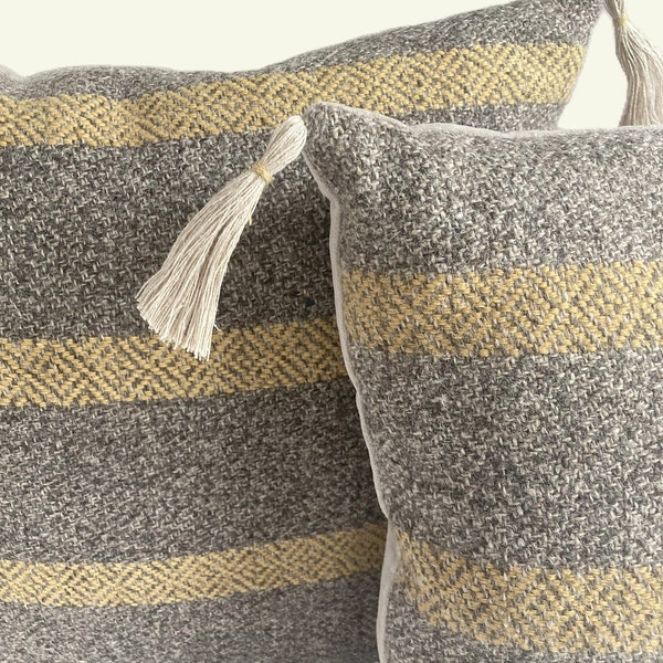 Handwoven wool cushion dyed using food waste