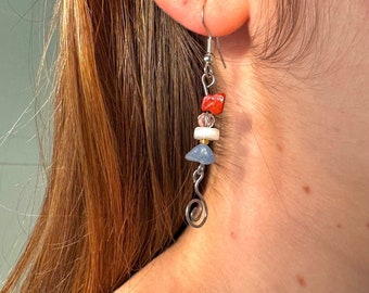 Dangling earrings: dripping spiral