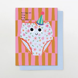 May include: A greeting card featuring a light blue pair of knickers with a pink floral and orange heart pattern, wearing a teal and green party hat. The text reads "bring on the big knickers" against a background of vertical pink and brown stripes.