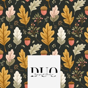 May include: A repeating pattern featuring autumnal leaves and acorns in gold, pink, and white on a dark background. The design includes the text "DUO Designed Studio" in a white rectangle.