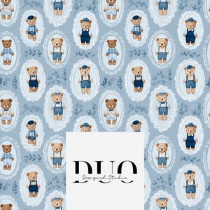 May include: A repeating pattern of teddy bears in blue outfits and hats, each framed in an oval with a white lace-like border. The bears are in various poses, with suspenders and bow ties. The background is a light blue color. The text "DUO Designed Studio" is at the bottom.
