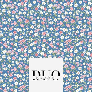 May include: A seamless pattern featuring a blue background with small white and pink flowers. The text "DUO Designed Studio" is in the centre of the image.