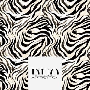 以下が含まれることがあります： 黒と白のシマウマ柄のパターン。中央に白い正方形があり、その中に黒い文字で「DUO Designed Studio」と書いてあります。