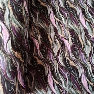 May include: Purple, green, and gold marbled fabric with a wavy pattern.