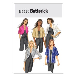 Könnte beinhalten: Ein Schnittmuster mit dem Titel "B5529 Butterick" mit Illustrationen von Frauen, die verschiedene Bolerojacken über Kleidern tragen. Die Jacken sind in Rosa, Gold, Silber, Weiß und blauem Blumenmuster gehalten. Die Kleider sind schwarz.
