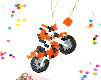 Enduro motorcycle with its rider pixel art bookmark