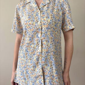 Vintage light yellow and blue long shirt in flowers print, romantic women’s summer blouse, size M-L