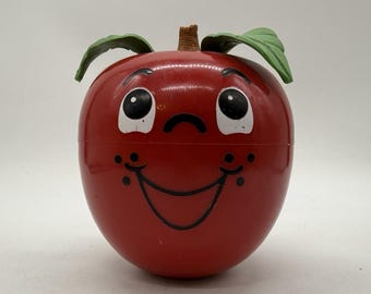 Juguete Fisher Price Happy Apple Roly Poly Chime con vástago corto, funciona, vintage de 1972, suave.