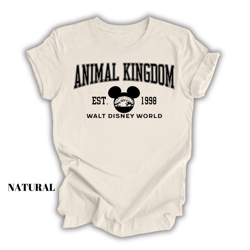 a white shirt with an animal kingdom logo on it