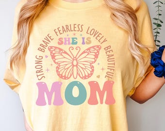 She Is Mom Shirt, Comfort Colors, Strong Brave Fearless Lovely Beautiful Mom Shirt,Butterfly Mother Shirt, Mother Inspirational Shirt 125807