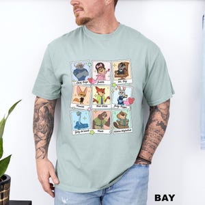 A man wearing a t-shirt with a graphic design of nine cartoon animal characters arranged in a 3x3 grid.