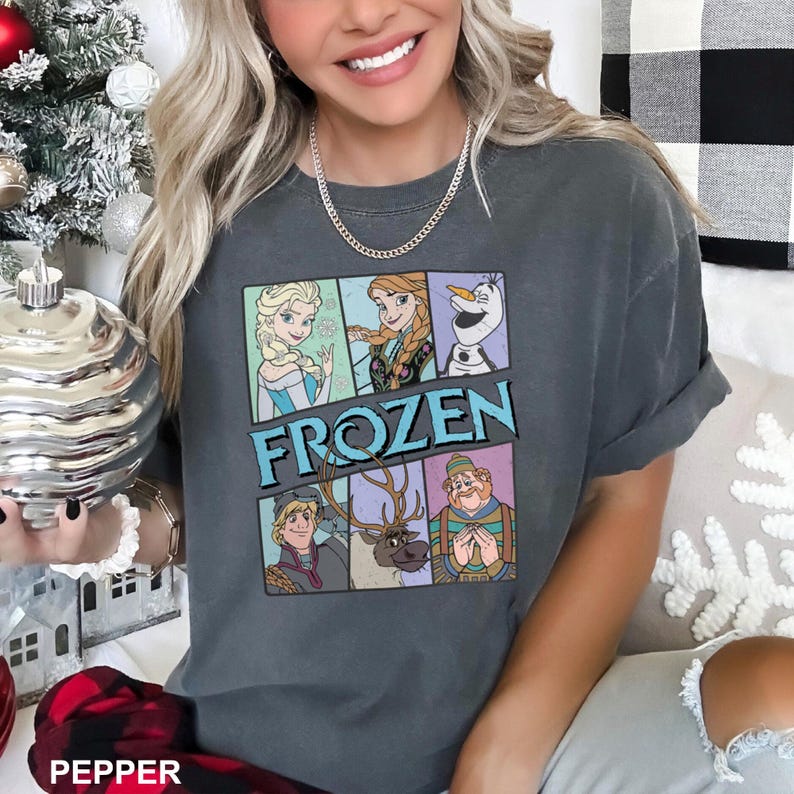 a woman sitting on a couch with a christmas tree in the background