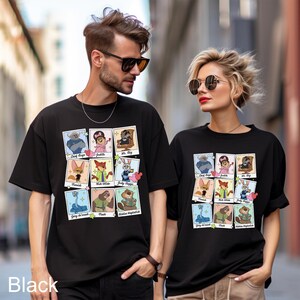 A man and a woman wearing black t-shirts with cartoon animal characters printed on them, standing together on a city street.