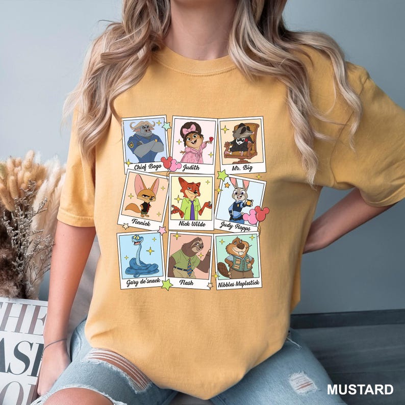 A yellow t-shirt with a collage of cartoon animal characters and their names printed on it.