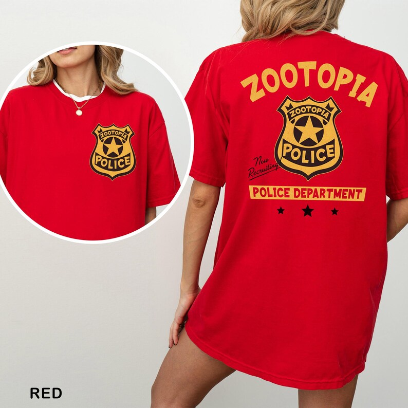 A red t-shirt with a police department logo and text, including the words "Zootopia Police Department" and "New Busting".