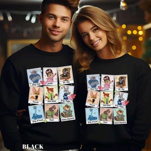 A man and a woman are standing next to each other, both wearing black sweatshirts with a collage of cartoon animal characters on them.