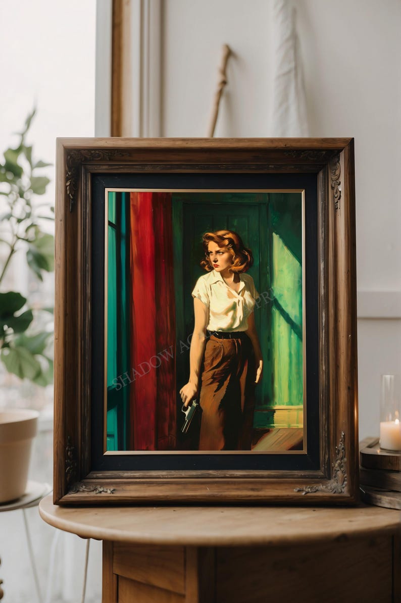 May include: A framed painting depicting a woman in a white shirt and brown trousers standing in a doorway. The woman is holding a gun in her right hand. The painting is set against a backdrop of a red curtain and a green door.