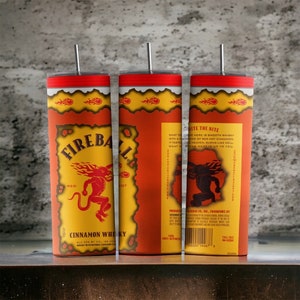 May include: Three Fireball Cinnamon Whisky tumblers with stainless steel straws. The tumblers feature a red and yellow design with the Fireball logo and text. The text includes "Cinnamon Whisky" and "Nite the Nite."