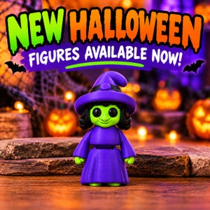 May include: A small witch figurine with a bright green face and black hair, wearing a purple hat and a matching purple dress. The text above the figure reads NEW HALLOWEEN FIGURES AVAILABLE NOW! in large, bold, colorful letters.