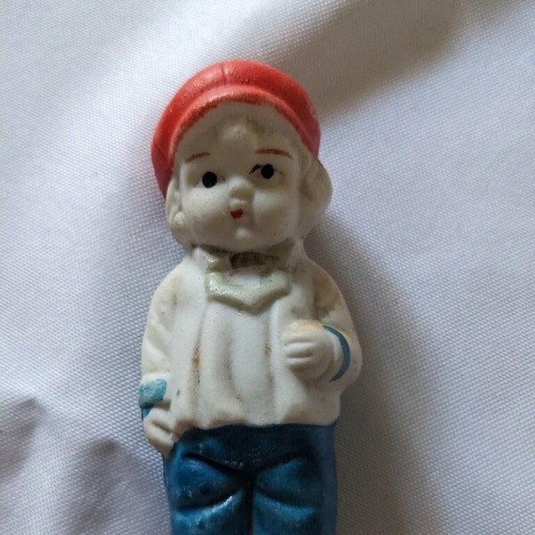 4 1/4" Bisque boy doll, Made in Japan, Molded body Cute face, Red hat blue pants