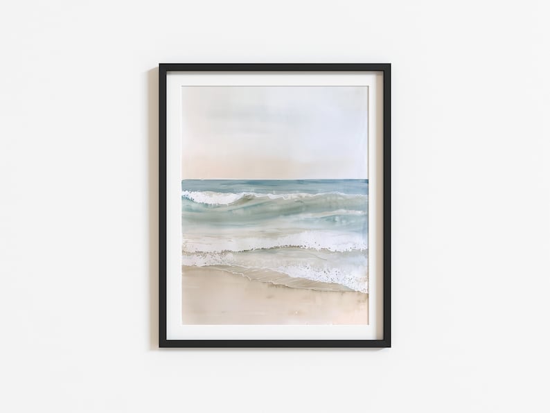 K&ouml;nnte beinhalten: Ein gerahmtes Aquarellbild eines Meeresbildes mit blauen und gr&uuml;nen Wellen, die an einem Sandstrand brechen.