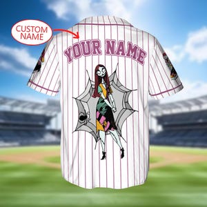 May include: White baseball jersey with purple pinstripes and the text "YOUR NAME" across the back. Features a cartoon illustration of a character from The Nightmare Before Christmas. The jersey has short sleeves and a button-up front.