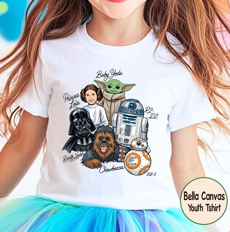 May include: White youth t-shirt featuring Star Wars characters: Princess Leia, Baby Yoda, Darth Vader, Chewbacca, R2-D2, and BB-8. The shirt includes the text "Baby Yoda", "Princess Leia", "Darth Vader", "Chewbacca", "R2-D2", and "BB-8". The shirt also has the text "Bella Canvas Youth Tshirt".