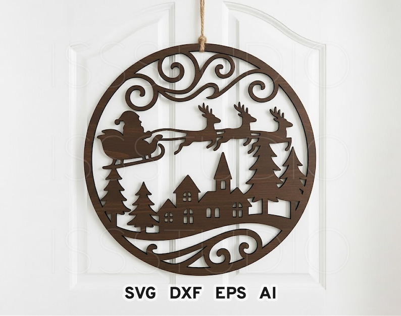 May include: A round, brown wooden Christmas decoration featuring Santa Claus in a sleigh pulled by reindeer over a village scene. The design includes pine trees and decorative swirls. The text "SVG DXF EPS AI" is at the bottom.