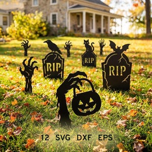 May include: A collection of black Halloween garden ornaments including tombstones with RIP lettering, skeletal hands, a crow, a cat, and a bat. One hand is holding a jack-o'-lantern bucket. These silhouettes are placed on a grassy lawn with autumn leaves.