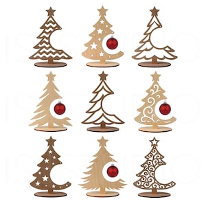 May include: Nine wooden Christmas tree decorations in various designs. Each tree has a star on top and a round base. Some trees feature cut-out patterns, while others have a red ornament. The trees are made of light and dark brown wood.