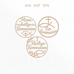 May include: Three laser-cut wooden circular designs with religious symbols and German text. Each circle features a different design: a fish with a cross, a cross with a fish, and a number 1 with a fish. The text includes "Meine heilige Kommunion" and "Zur Kommunion".