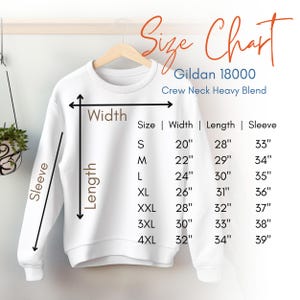 May include: Size chart for Gildan 18000 Crew Neck Heavy Blend sweatshirts. The chart shows the width, length, and sleeve length in inches for sizes S through 4XL.