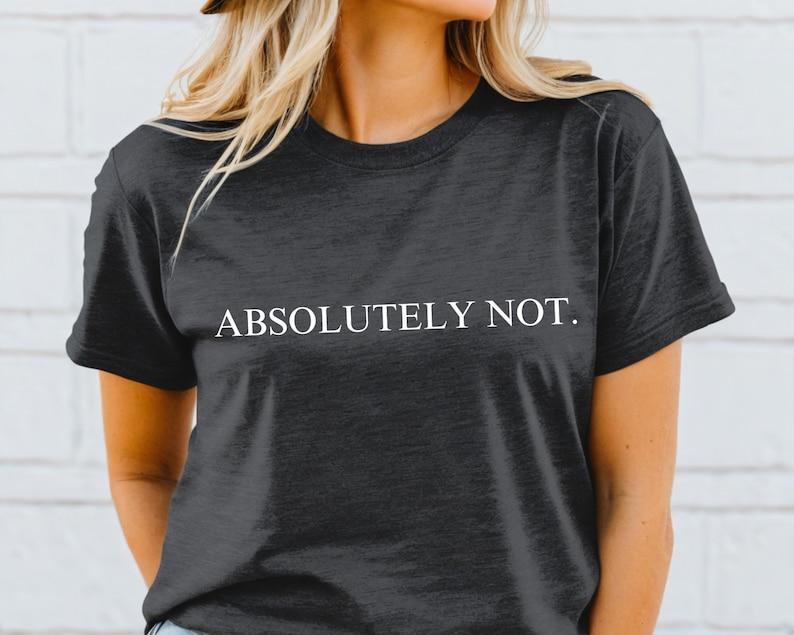 May include: A dark gray t-shirt with the text "ABSOLUTELY NOT." printed in white.