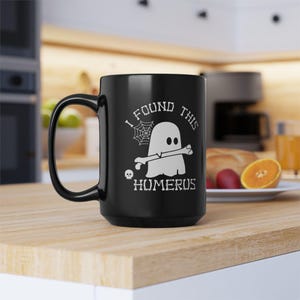 Ik vond deze opperarmbeen geest koffiemok, Halloween-mok, Halloweencadeau en -decor, grappige Halloween-mok, Halloween-koffiekop, spookzwarte mok afbeelding 5