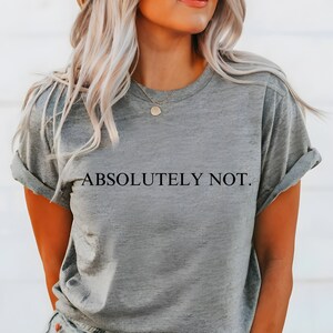 May include: A gray t-shirt with the text "ABSOLUTELY NOT." printed in black.