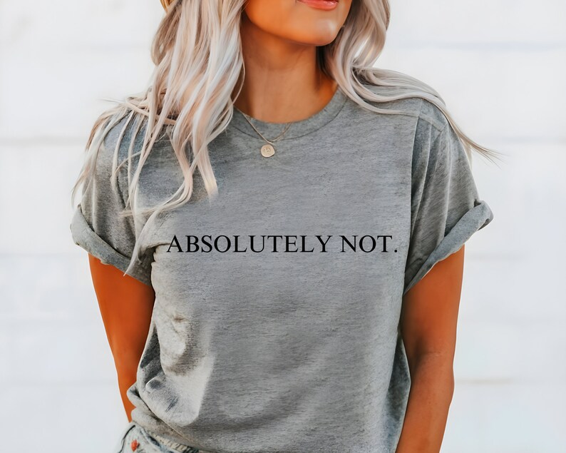May include: A gray t-shirt with the text "ABSOLUTELY NOT." printed in black.