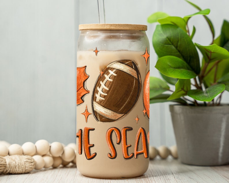 Fall Iced Glass Coffee Cup, Tis The Season, Fall Glass Cup with Lid and Straw, Glass Tumbler, Glass Can, Fall Gifts, Coffee Football Pumpkin 16oz Clear