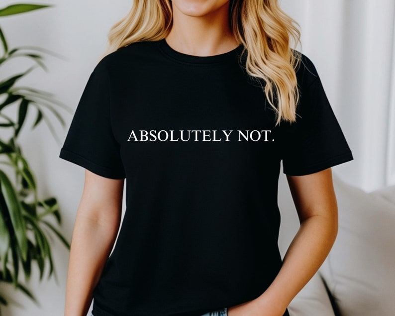 May include: A black t-shirt with the text "ABSOLUTELY NOT." printed in white on the front.