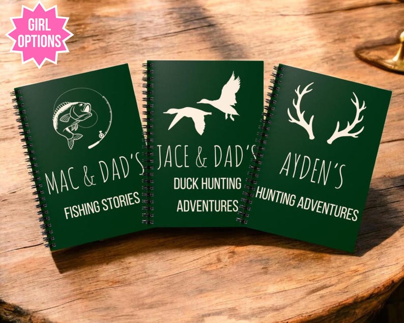 May include: Three green spiral bound journals with white text and illustrations. The first journal says "Mac & Dad's Fishing Stories". The second journal says "Jace & Dad's Duck Hunting Adventures". The third journal says "Ayden's Hunting Adventures".