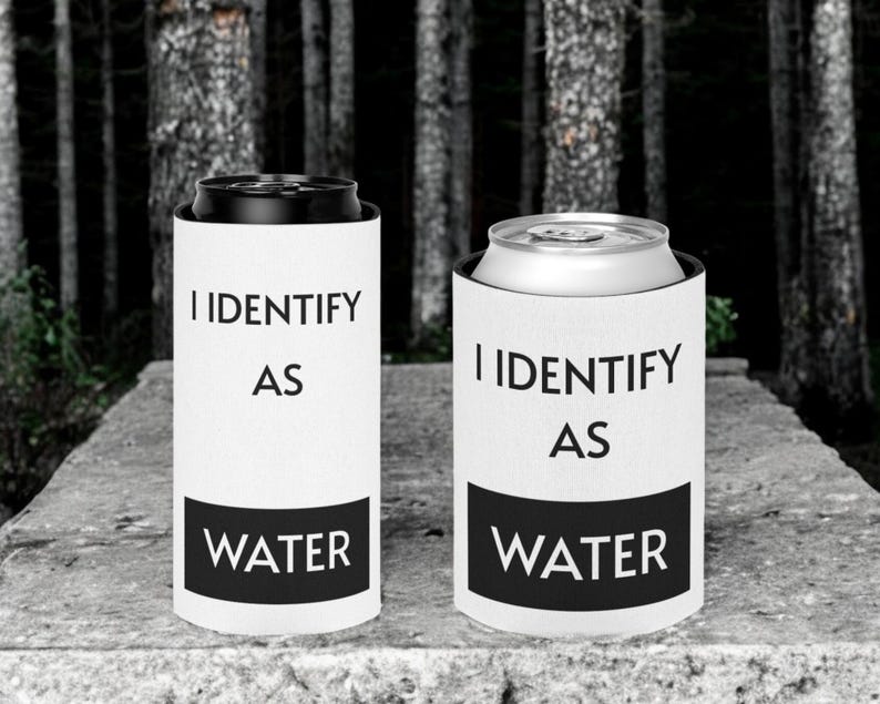 May include: Two white can coolers with black text that reads "I identify as water".