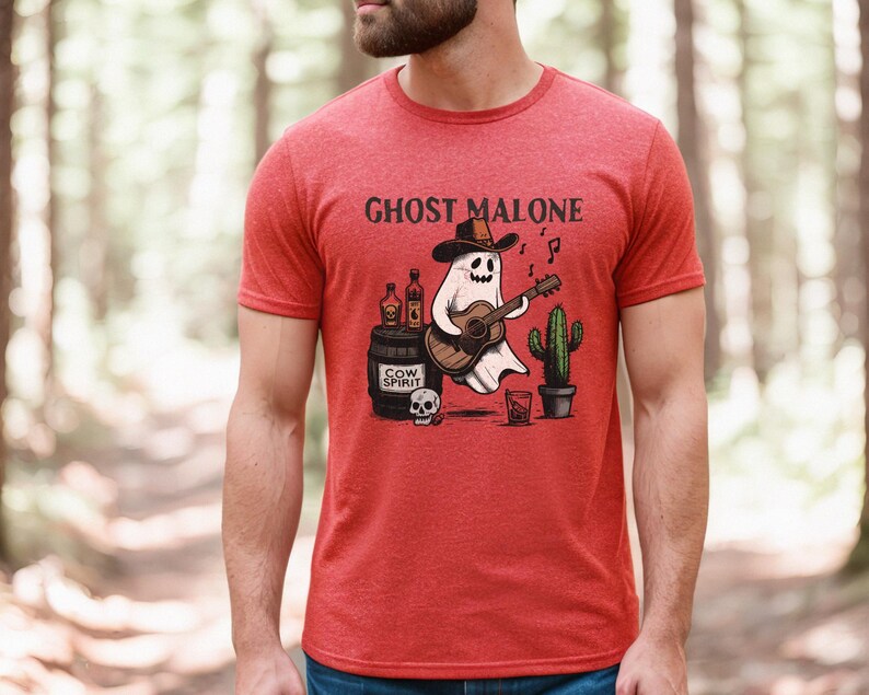 May include: Red t-shirt with a graphic of a ghost wearing a cowboy hat and playing a guitar. The text "Ghost Malone" is printed on the shirt.