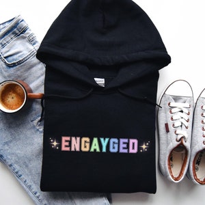 LGBTQ Pride Engayged Rainbow Hoodie Lesbian Gift Engagement Announcement Sweatshirt Lesbian Brides Gay Grooms Queer Wedding Mrs and Mrs