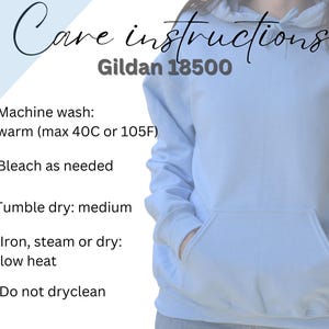 May include: Care instructions for a Gildan 18500 garment. Machine wash warm (max 40C or 105F), bleach as needed, tumble dry medium, iron low heat, do not dry clean.