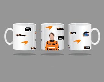 May include: Three white ceramic mugs with a racing theme. The mugs feature a driver in a racing suit, a racing car, and the McLaren logo. The text "PIA" is printed on two of the mugs.