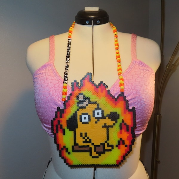 Dog Sitting On A Bench Sureounded By Fire Kandi Perler Necklace