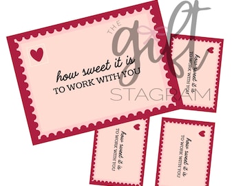 May include: Three pink and red cards with scalloped edges and a heart design. The text on the cards reads "how sweet it is to work with you".