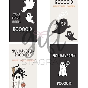 May include: Four printable Halloween cards featuring ghosts with the text "You have been booo'd" and "Happy Halloween".