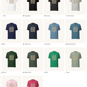 May include: A color chart displaying fourteen short-sleeve t-shirts in various shades including white, black, grey, navy, blue, green, and pink. Each shirt features the text 'JUST ONE BREATH NO TANKS NEEDED' printed in a light color on the chest area.