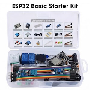 May include: An open, clear plastic case labeled "ESP32 Basic Starter Kit" containing various electronic components. The kit includes circuit boards, sensors, wires, LEDs, and other small parts, ideal for electronics projects and learning.
