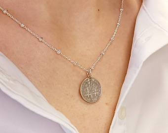 Sterling silver necklace with old coin pendant